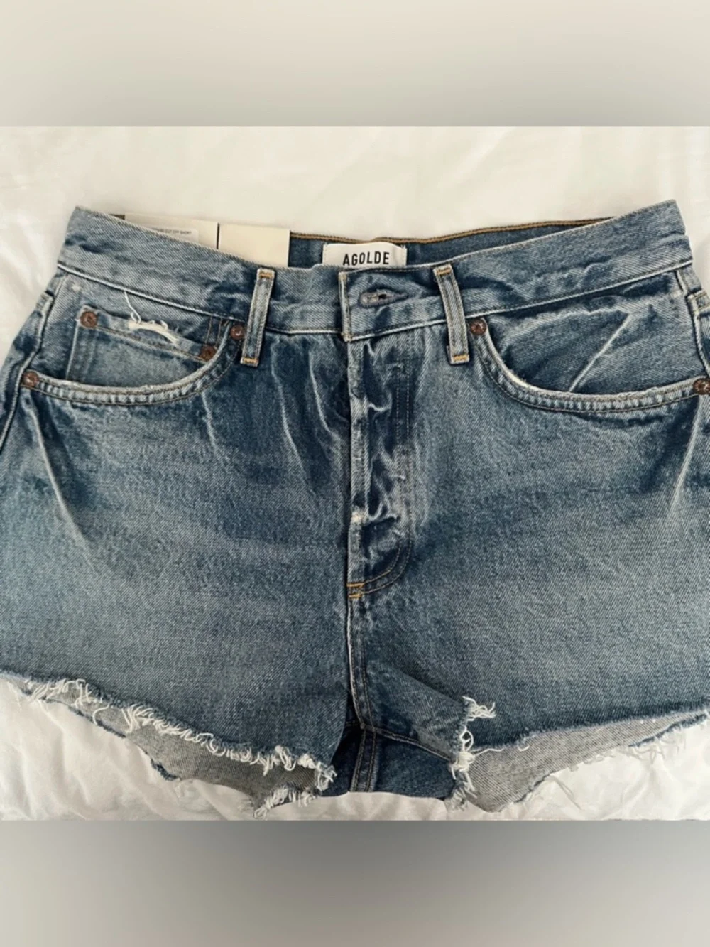 AGOLDE Women's Frayed Hem Denim Shorts Color: Swapmeet. 100% Regenerative Cotton - Picture 1 of 3